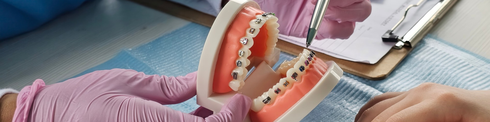 Patient receives expert advise about braces from our orthodontist Dr. Greenburg in Timnath CO